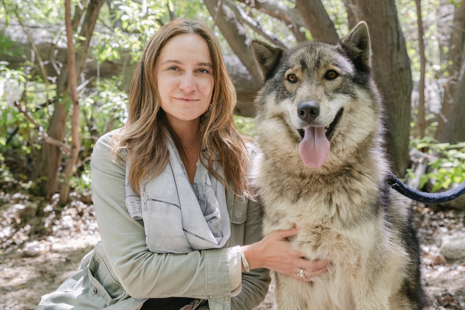 Ashley Avis with a wolf at Wolf Connection in Acton, California